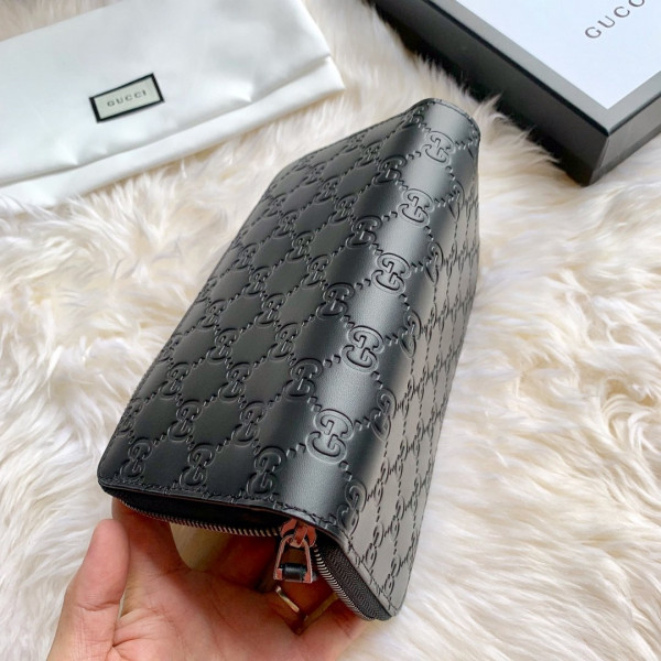 G*u*i leather zip around wallet