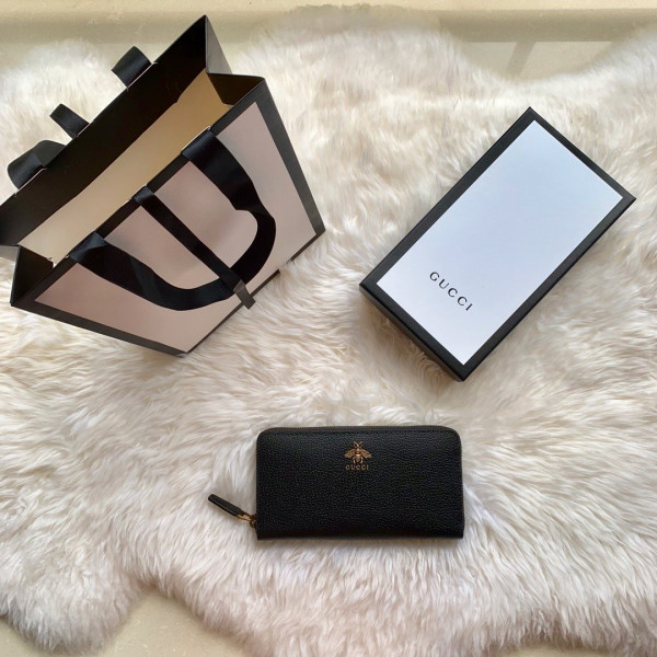 G*u*i leather zip around wallet