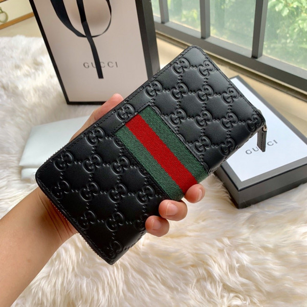 G*u*i leather zip around wallet