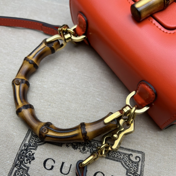 G*u*i mini top handle bag with bamboo