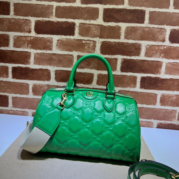G*u*i gg matelassé leather top handle bag