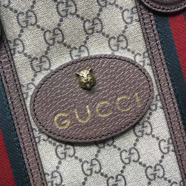 G*u*i tote bags