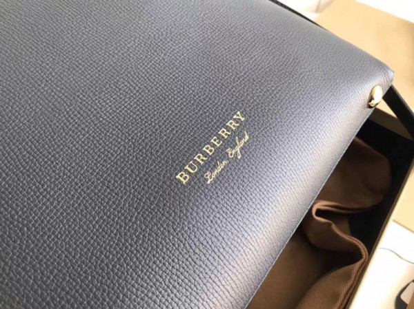 B**rry the small banner in leather and house check