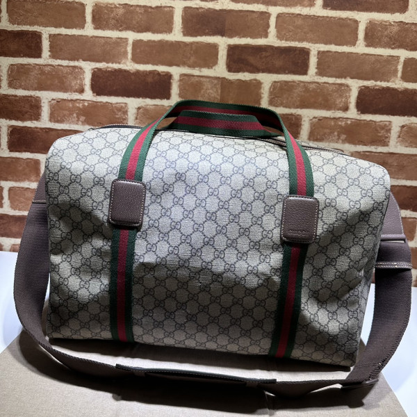 G*u*i medium duffle bag with web