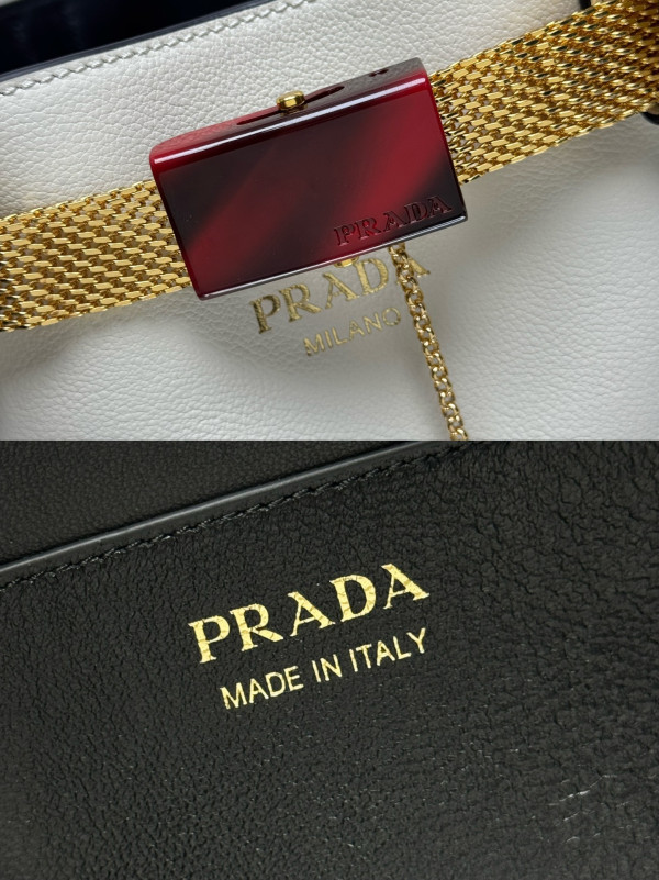 Pra*a buckle leather bucket bag with jeweled belt