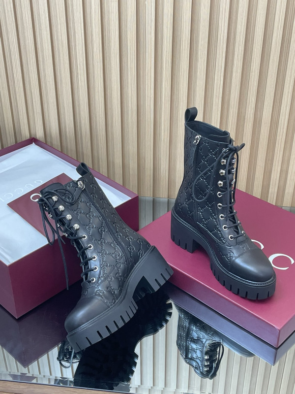 G*u*i boots