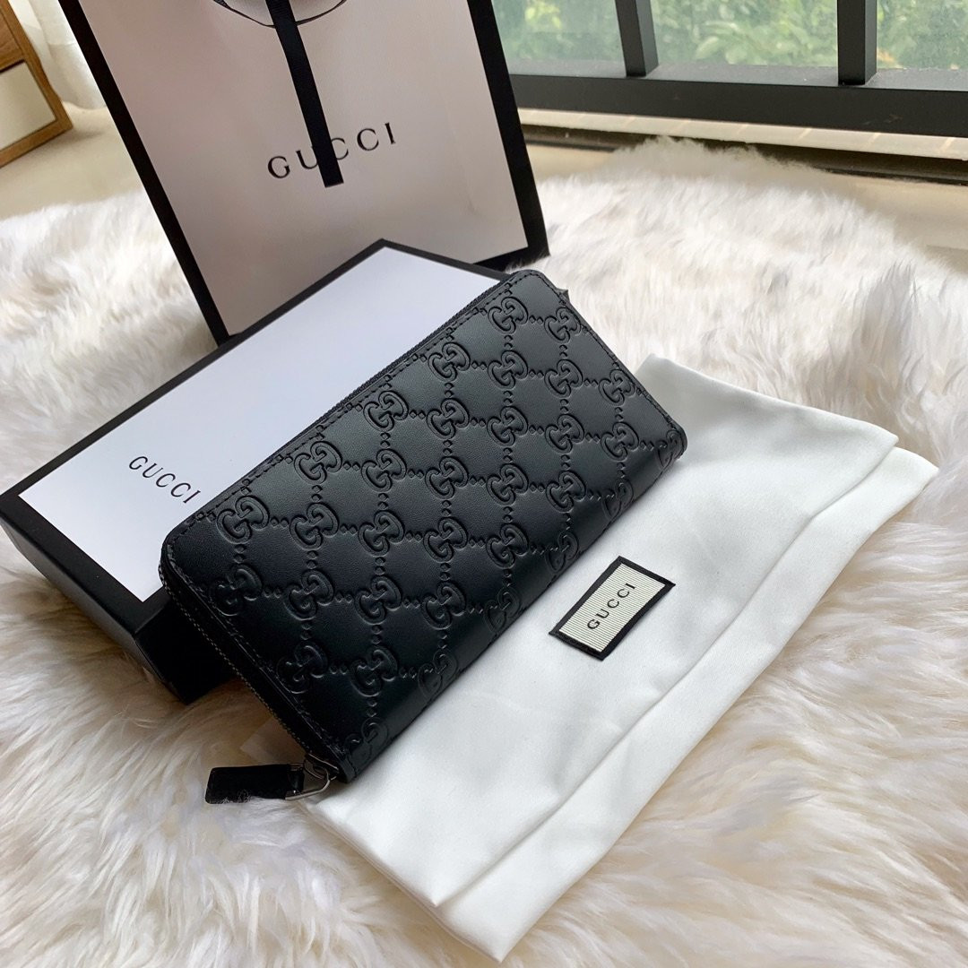 G*u*i leather zip around wallet