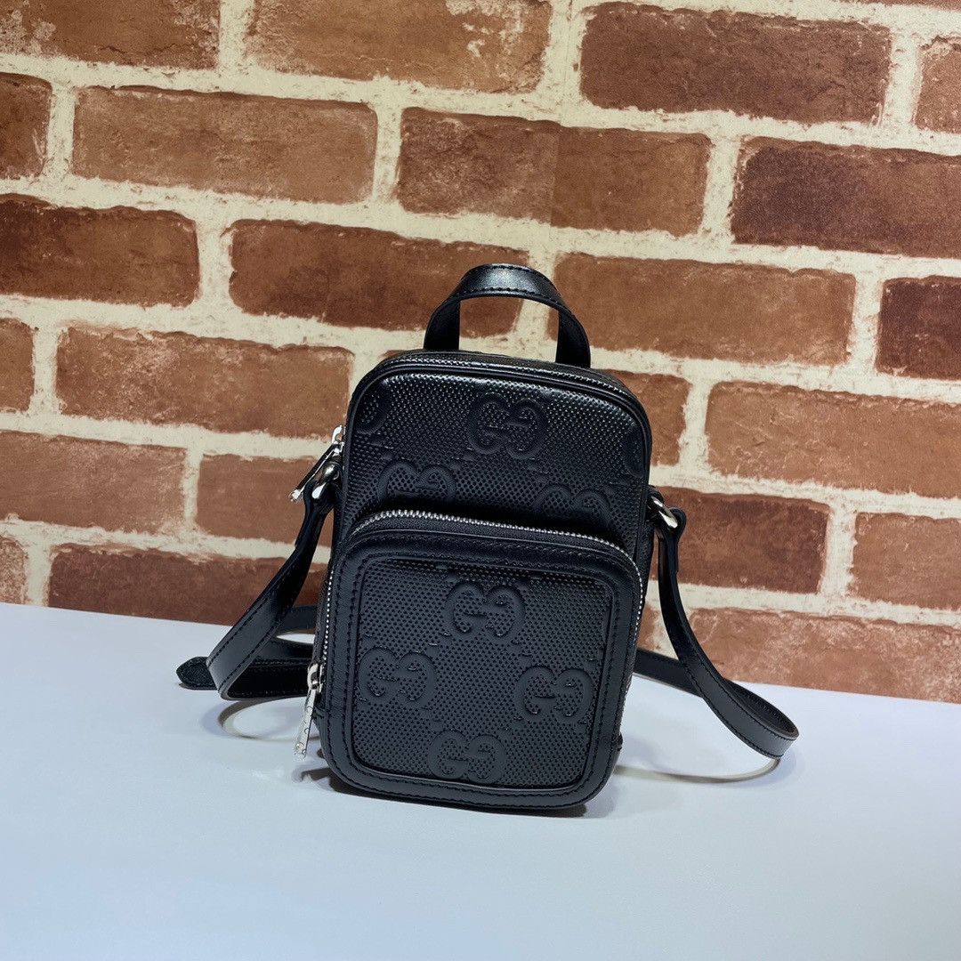 G*u*i gg embossed mini bag