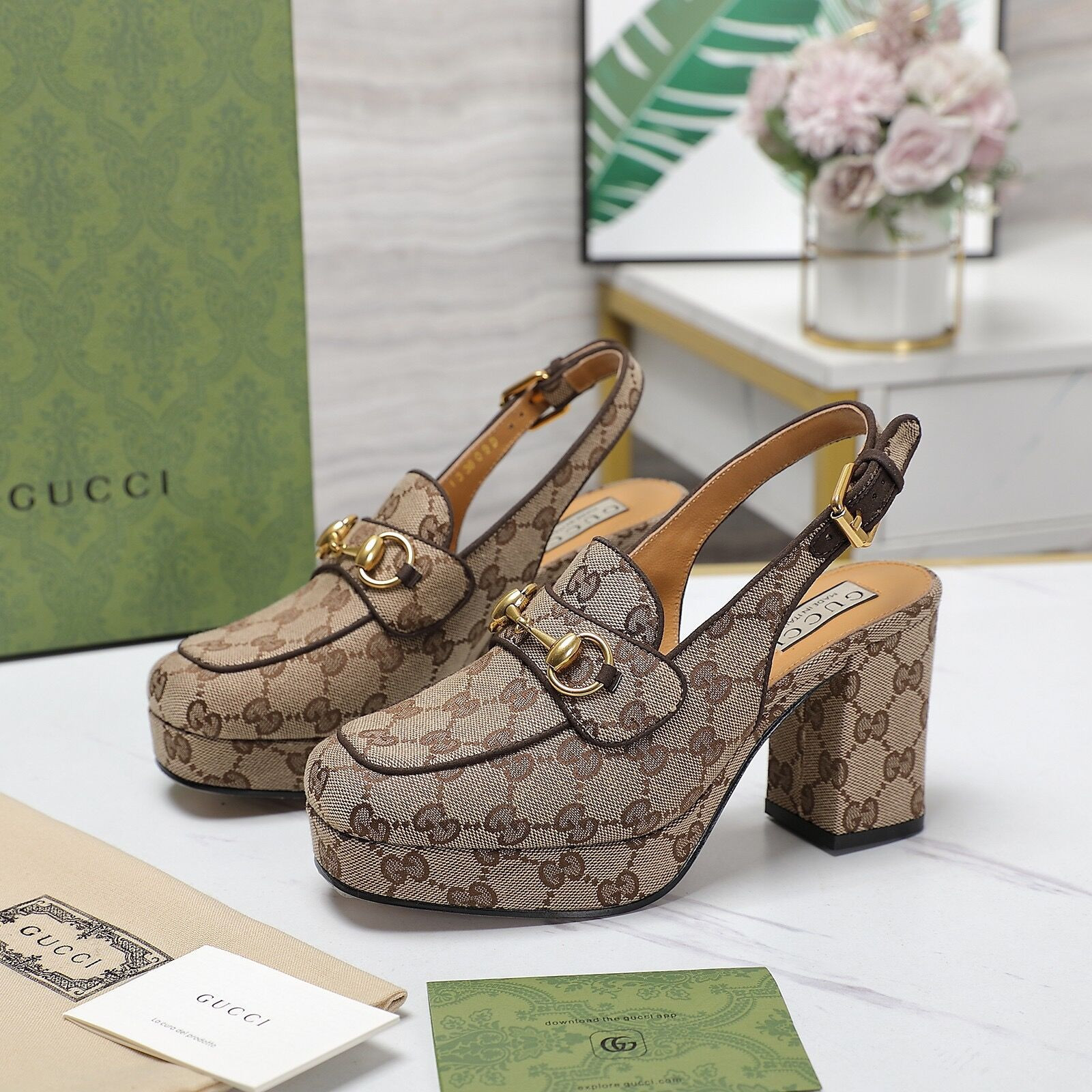 G*u*i women's horsebit mule