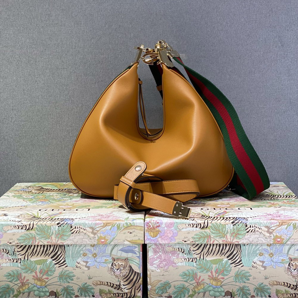 G*u*i attache large shoulder bag